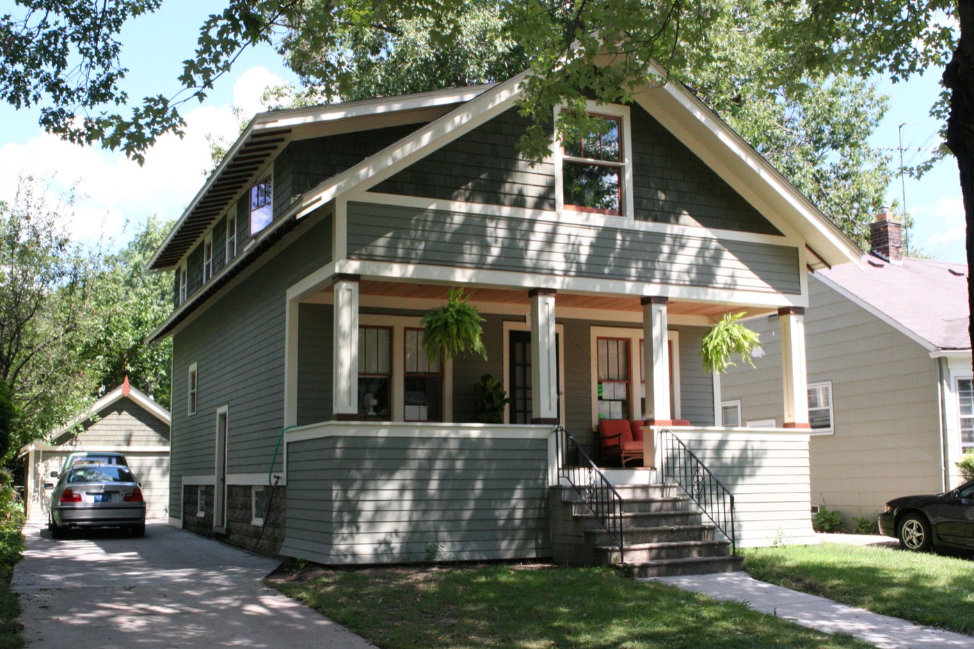 Craftsman home with new fiber cement siding by Kadans Construction